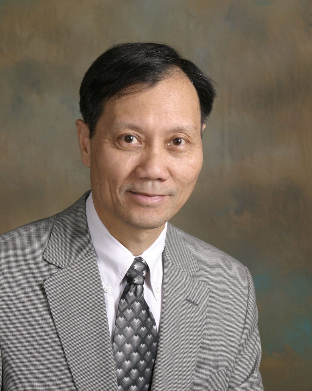 A headshot of Lawrence S. Chan