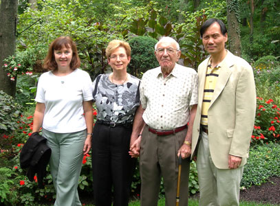 Dr. Albert Slepyan standing next to three other individuals