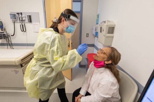 Alma Aguilar undergoes a nasal swab as she participates in the RECOVER research study at the University of Illinois Chicago, Thursday, March 10, 2022, at UI Health Mile Square Health Center. (Photo: Joshua Clark/University of Illinois Chicago)