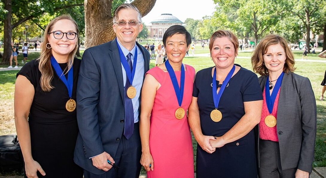Operation Vaccine Team: From left, Mary Kate Titus, administrative fellow; Paul Gorski, senior director of Clinical Services; Dr. Janet Lin, physician and professor of Emergency Medicine; Kim Bertini, director of Nursing Excellence; and Dr. Susan Bleasdale, Chief Quality Officer.