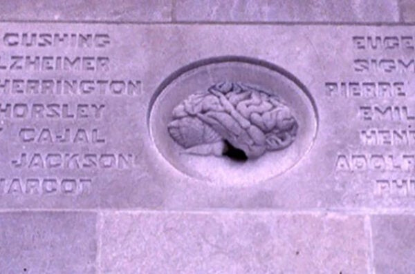 Founding fathers of modern neurology and neurosurgery (left) and psychiatry (right), Inscribed on the rear entrance of the NPI Building.