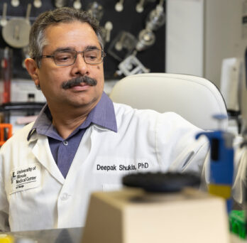 Dr. Deepak Shukla sits in his research lab.
                  